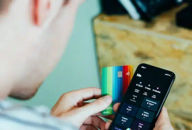 person holding black remote control